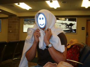 Flying back from the Fla trip, the airline said babies could board first, so here E is acting like a baby. 